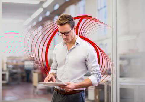 Man holding tablet in office