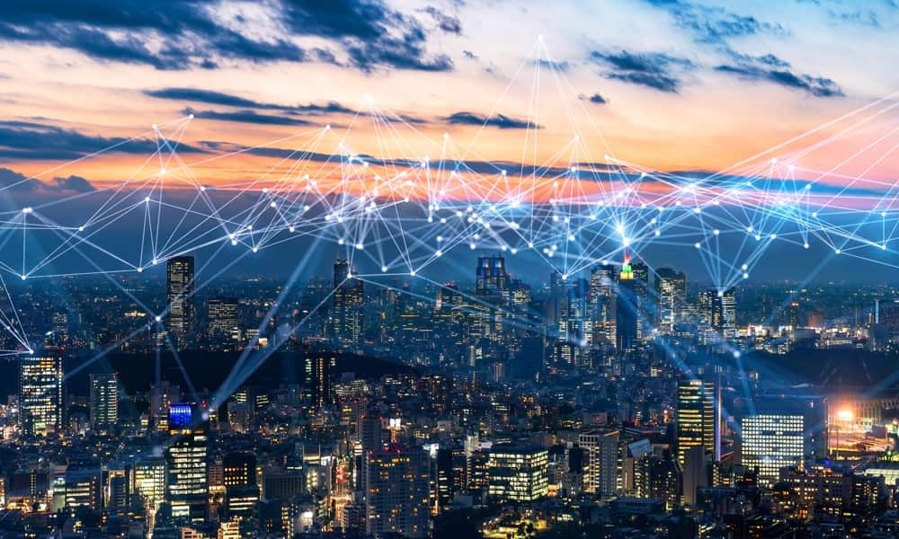 Hundreds of light beams connecting over a cityscape