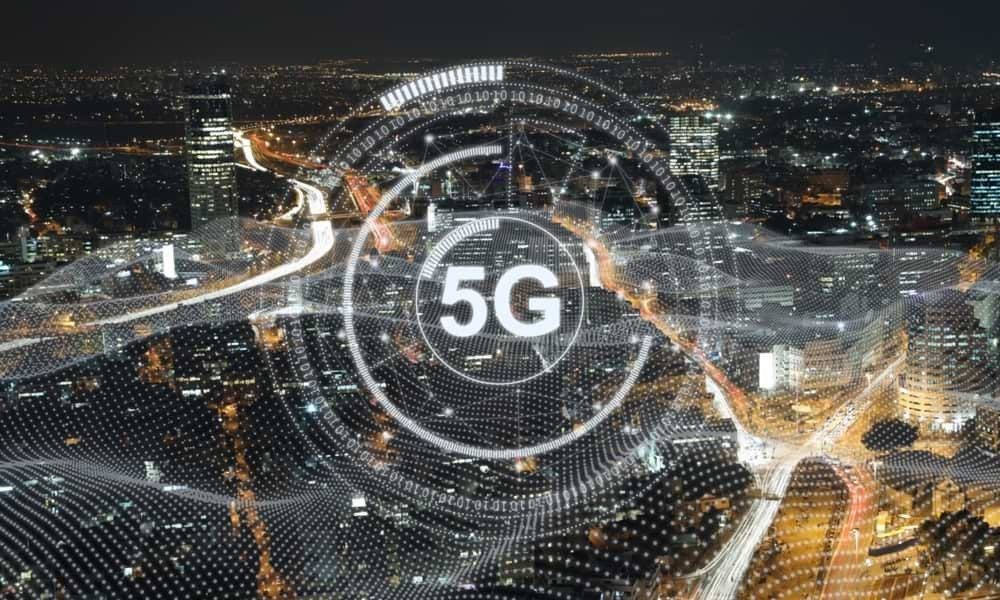 Nighttime image of bustling city with 5G overlayed